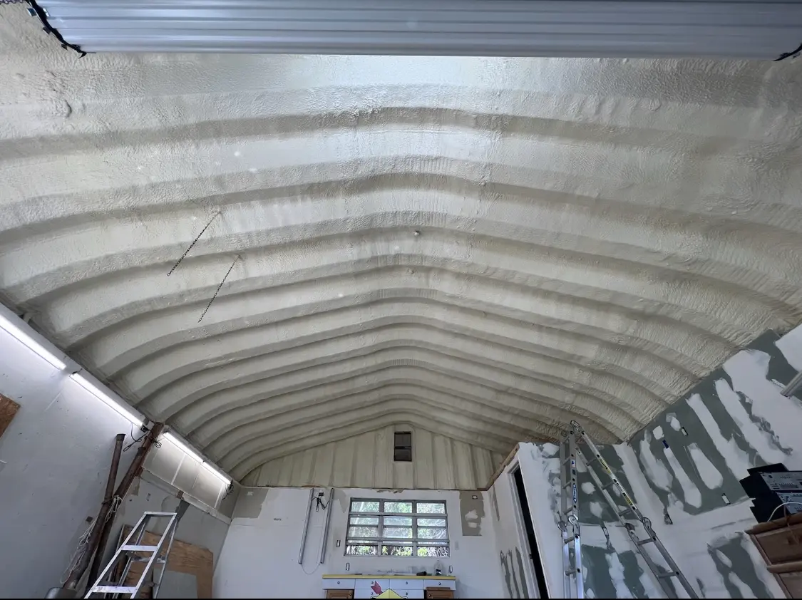 Spray polyurethane foam applied to the underside of a metal roof deck in New Fairfield